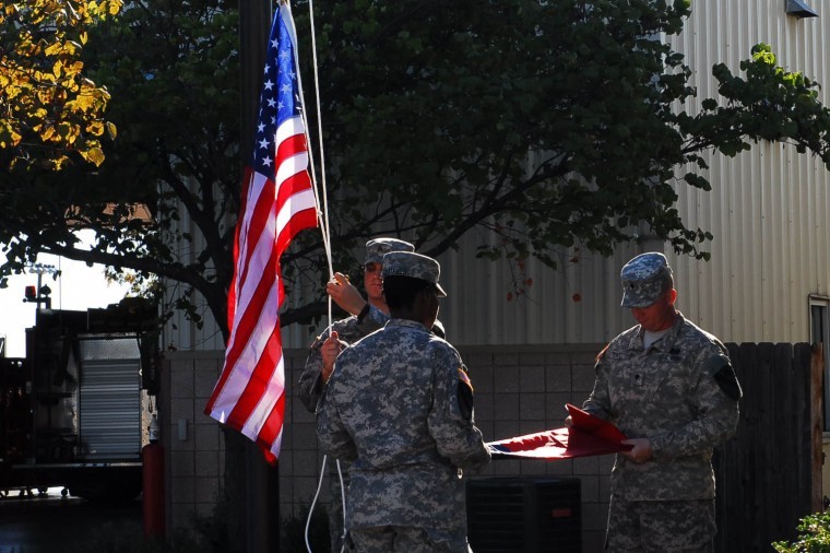 Ironhorse soldiers, fire fighters dedicate flagpole on 9/11
